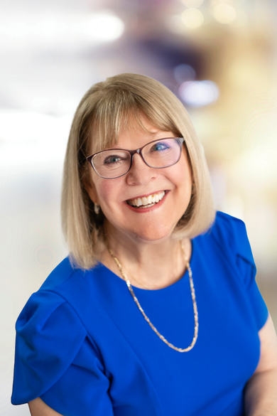 Portrait of Andrea Thomas, REALTOR®.